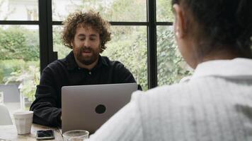 Man talking vividly with woman on the opposite video