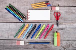 assortment of school supplies of different colors for the school photo