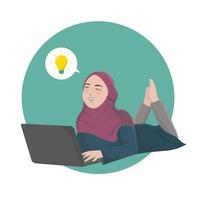 moslem woman using laptop finds idea