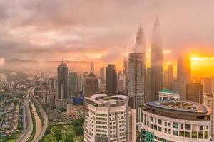 Downtown Kuala Lumpur skyline at twilight photo