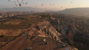 Cappadocia landscape and balloons aerial view video