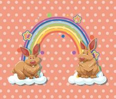 Two rabbits on the cloud with rainbow on polka dot background vector