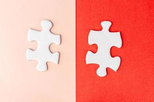 Two pieces of jigsaw puzzle photo
