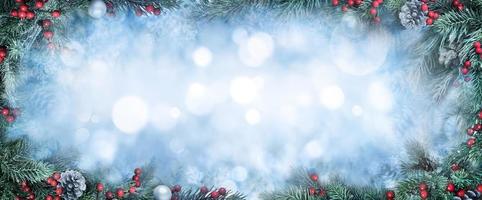 Christmas fir branches and bokeh background photo
