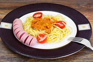 Pasta with Sausage and Squash Caviar on Plate photo