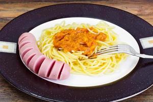 Pasta with Sausage and Squash Caviar on Plate photo