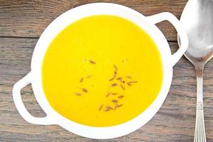Diet and Healthy Organic Food. Pumpkin Soup. photo
