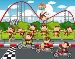 Escena de pista de carreras con monos montando motocicletas.