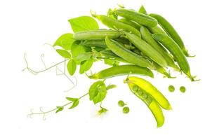 Pods and shoots of green peas isolated on white background. photo