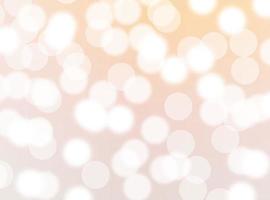 Gold and white. Bokeh colorful glows sparkle beautiful On orange background . Valentines Day concept. New year day photo
