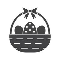 Easter basket glyph icon. Silhouette symbol. Basket with eggs and bow. Negative space. Vector isolated illustration