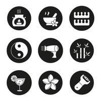 Spa salon icons set. Aromatherapy candle, toes separators, mortar and pestle, hairdryer, plumeria, bamboo sticks, cocktail, foot file, yin yang. Vector white silhouettes illustrations in black circles
