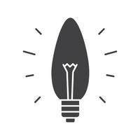 Energy saving lightbulb glyph icon. Silhouette symbol. Economy lamp. Negative space. Vector isolated illustration