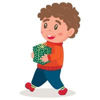 A little cartoon curly-haired boy in a warm sweater walks and carries a Christmas present. isolated on white background vector