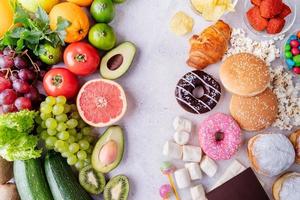 Healthy and unhealthy food top view flat lay