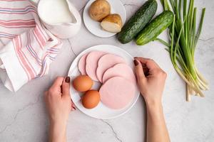 Step by step preparation of cold okroshka soup with sausage, step 1 - preparation of the necessary ingredients photo