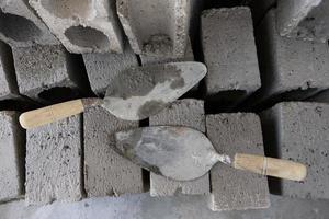 Trowels and blocks for builind walls photo