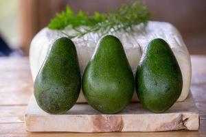 Large fresh cheese with avocados