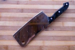 Knife on Chopping board photo