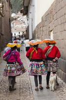 CUSCO, PERU, JANUARY 1, 2018 - Unidentified women on the street of Cusco, Peru. the Entire city of Cusco was designated a UNESCO World Heritage Site in 1983.