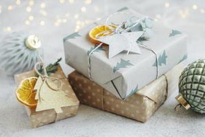 Christmas  decorative homemade gift box wrapped in brown kraft paper