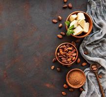 Cocoa beans, powder and butter photo