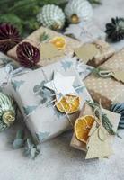 Christmas  decorative homemade gift box wrapped in brown kraft paper
