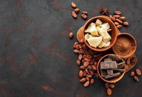 Cocoa beans, butter and chocolate photo