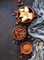 Cocoa beans, powder and butter photo