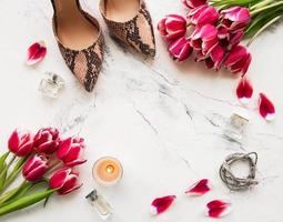 Feminine accessories and tulips photo