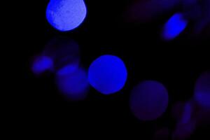 abstract dark blue sparkler overlays elegant texture blur sparkling on black. photo