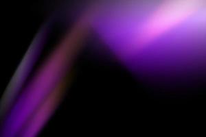 abstract lite purple sun flare overlays texture and colorful neon blur on black.