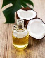 Bottle with coconut oil photo