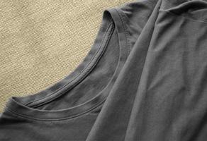 Template of grey t-shirt in fabric surface photo