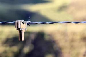 keys hanging on wire, fighting for achievement and professional and personal success photo