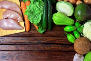 low carbohydrate foods consumed in the low carb, ketogenic and paelolitic diets on rustic wooden table photo