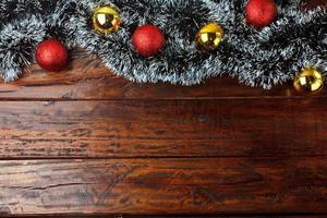 Christmas ornament on rustic wooden background. Copy space. Space for texts and messages photo