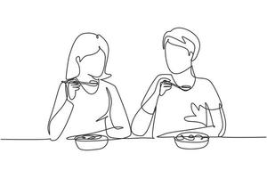 Single continuous line drawing young couple having salad meal around table. Happy male female sitting eating lunch together in restaurant. Dynamic one line draw graphic design vector illustration