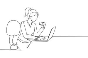 Single one line drawing young woman sitting on chair and typing entering credit card code on laptop around desk. Digital payment concept. Modern continuous line draw design graphic vector illustration