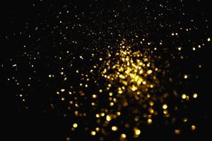 oro patrón abstracto brillo stardust luces brillantes grunge en negro. foto