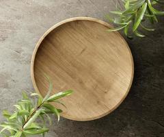 Wooden kitchen board. On a grey stone background with leaves. Top view. Free space for text. 3d illustration photo