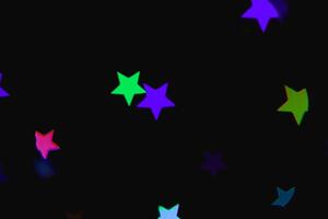 light colorful blue star light effect isolated overlay glitter texture on black. photo