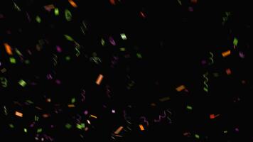 colorful rainbow confetti sparkle abstract texture overlays glitter golden particles on black. photo