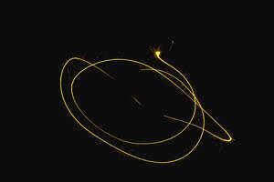 abstract curve gold yellow sparkler overlays texture elegant surface pattern on black. photo