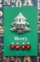 Merry Christmas and tree and xmas red ball decoration with green notebook on old type pattern photo