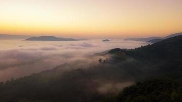 Foggy beautiful landscape aerial view shoot from drone. Phu Pha Duk Nong Khai, Thailand. photo