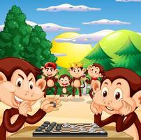 Two monkeys playing chess together vector