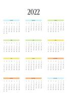 Plantilla de calendario 2022 en estilo estricto clásico con elementos multicolores. Calendario Mensual Calendario Individual Minimalismo Diseño Restringido Para Cuaderno De Negocios. la semana comienza el domingo vector