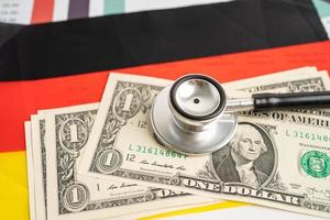 Black stethoscope on Germany flag background, Business and finance concept. photo