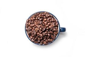 Coffee cup and coffee beans on a white background photo